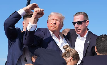Trump é alvo de tiros e sai ferido de comício nos Estados Unidos